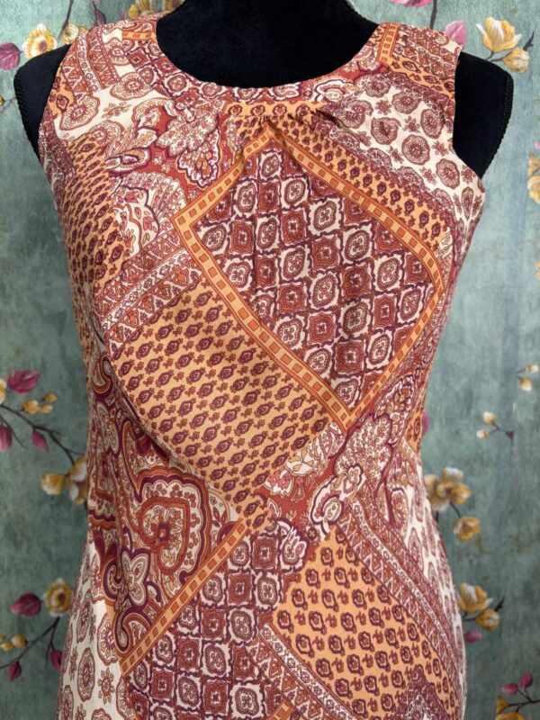 1000405848 Vestido patchwork en tonos terracota