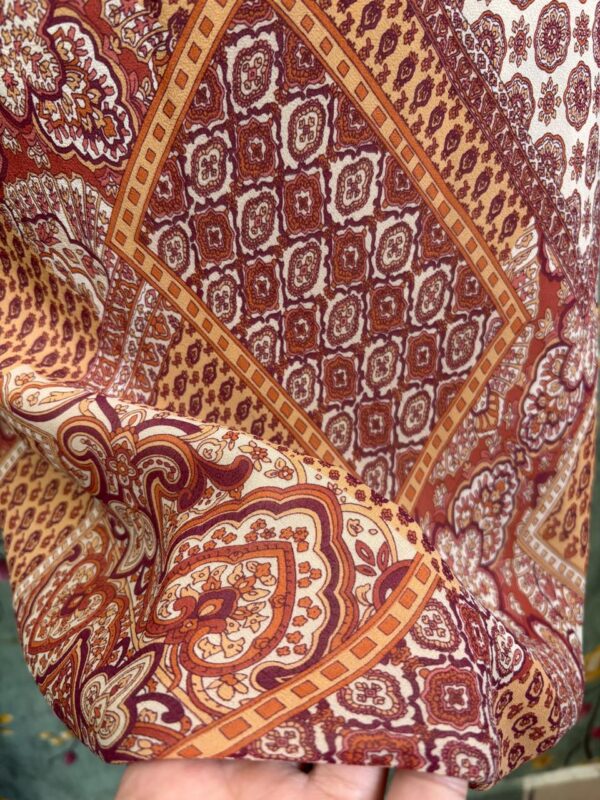 1000405851 Vestido patchwork en tonos terracota