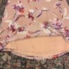 1000408762 Falda floral en tonos duraznos
