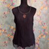 1000412195 Blusa negra translucida